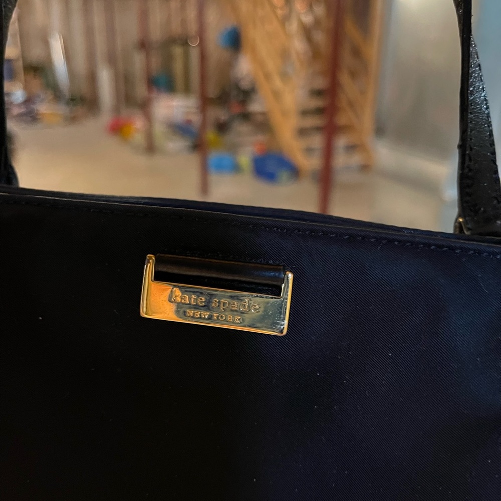 Black Kate Spade purse with gold hardware